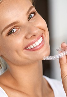 Woman with Invisalign near Lewis Center smiling