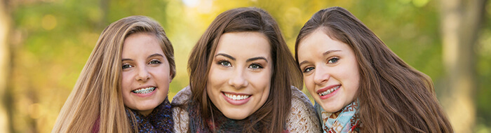 three woman smiling