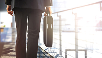 man walking with briefcase