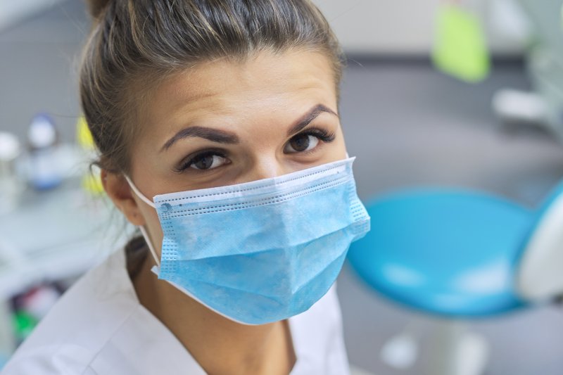 Orthodontist wearing mask in her treatment area