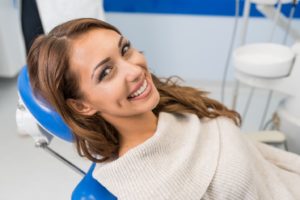Woman smiling after interproximal reduction and orthodontic treatment
